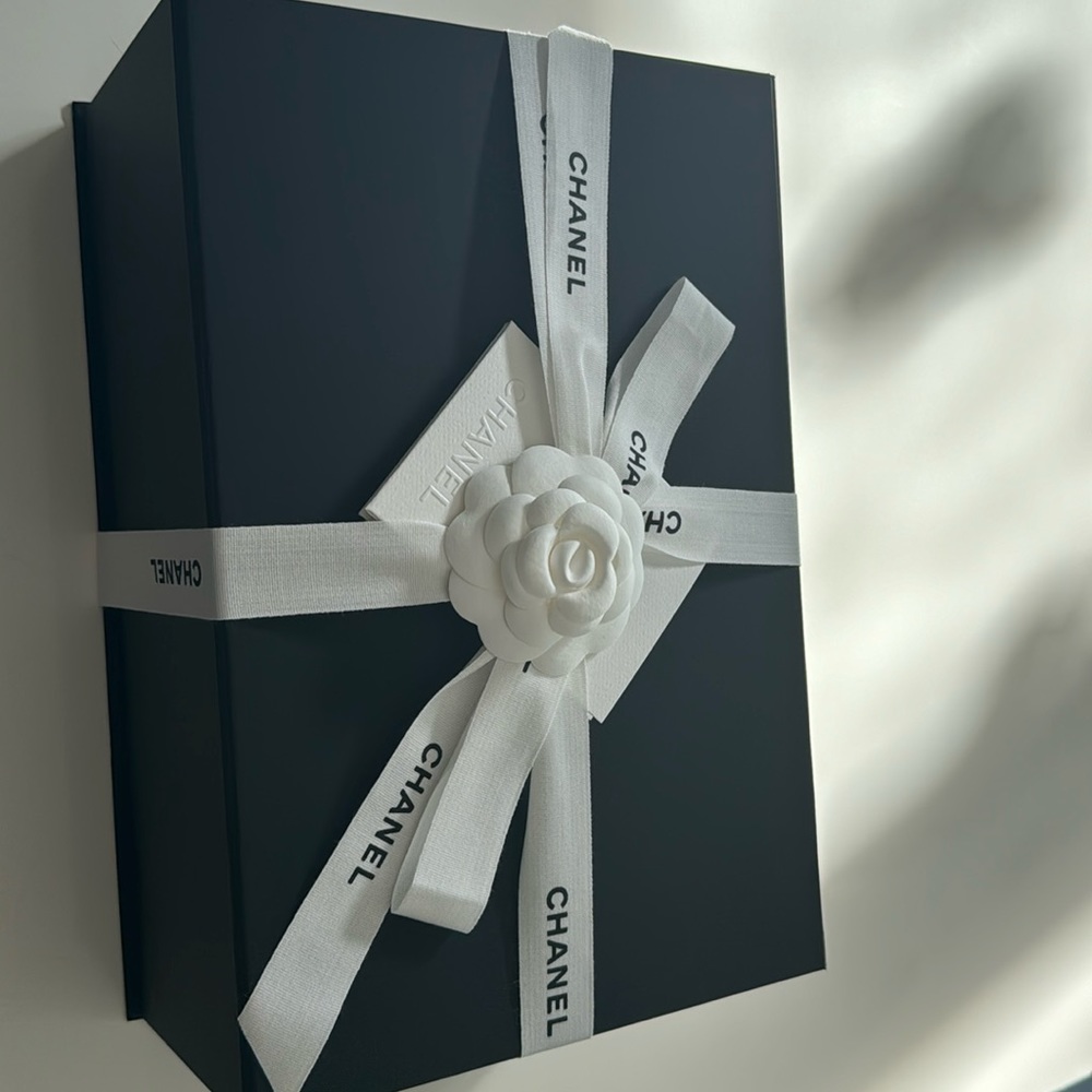 Chanel box with ribbon and signature flower